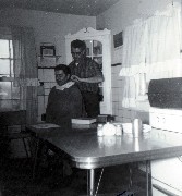 Bruce Dorrough giving Omer Sayger haircut